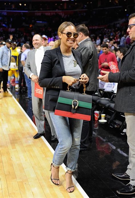 beyonce courtside gucci bag lays|Beyoncé Attends a Los Angeles Clippers Game in a Gucci Blazer .